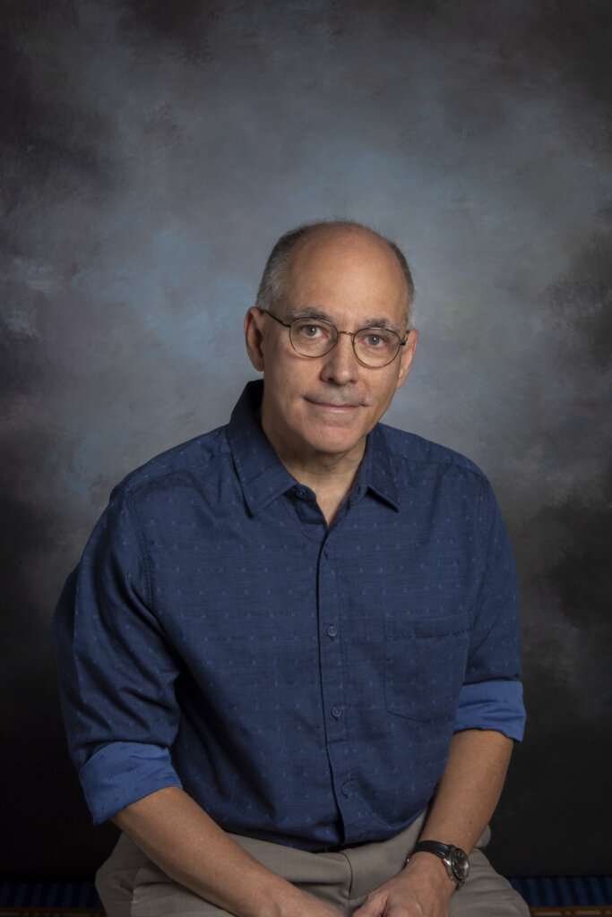 A photo of a man wearing a blue shirt