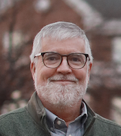 a photo of a man wearing glasses