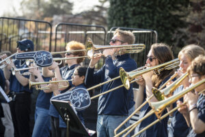 Photo of students in the Pep Band playing instruments during the Send-Off event