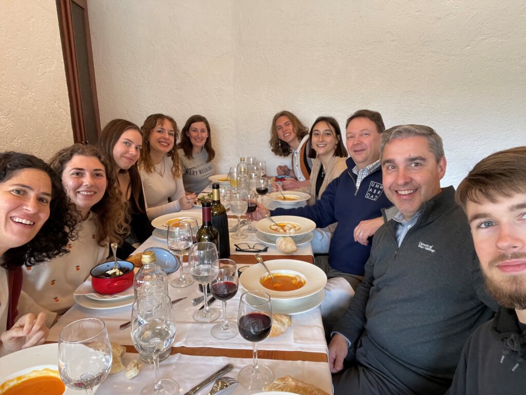 A group of UMW students and two administrators dining in a restaurant in Bilbao, Spain.