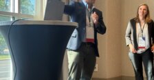 Marty Bywaters-Baldwin giving a presentation at a Symposium