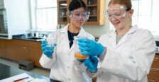 Ashley Lam in the lab doing an experiment with a fellow student in a UMW classroom 