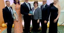 Marty Bywaters-Baldwin poses with coworkers from Rappahannock Goodwill