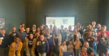 A photo of a large group of alumni at a brewery in Richmond.