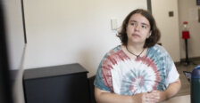 A student peers at a screen