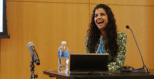 A 2012 alumna accepts a UMW alumni award in Seacobeck Hall's Weatherly Wing.