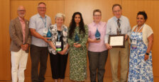 UMW President Troy Paino, Alumni Association leaders and four alumni holding awards.