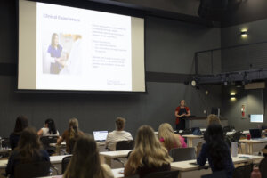 new students in the MSN program in the audience with a speaker at the front of the room
