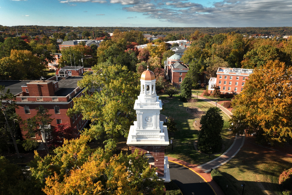 A photo of campus in fall with the Bell Tower at the center.