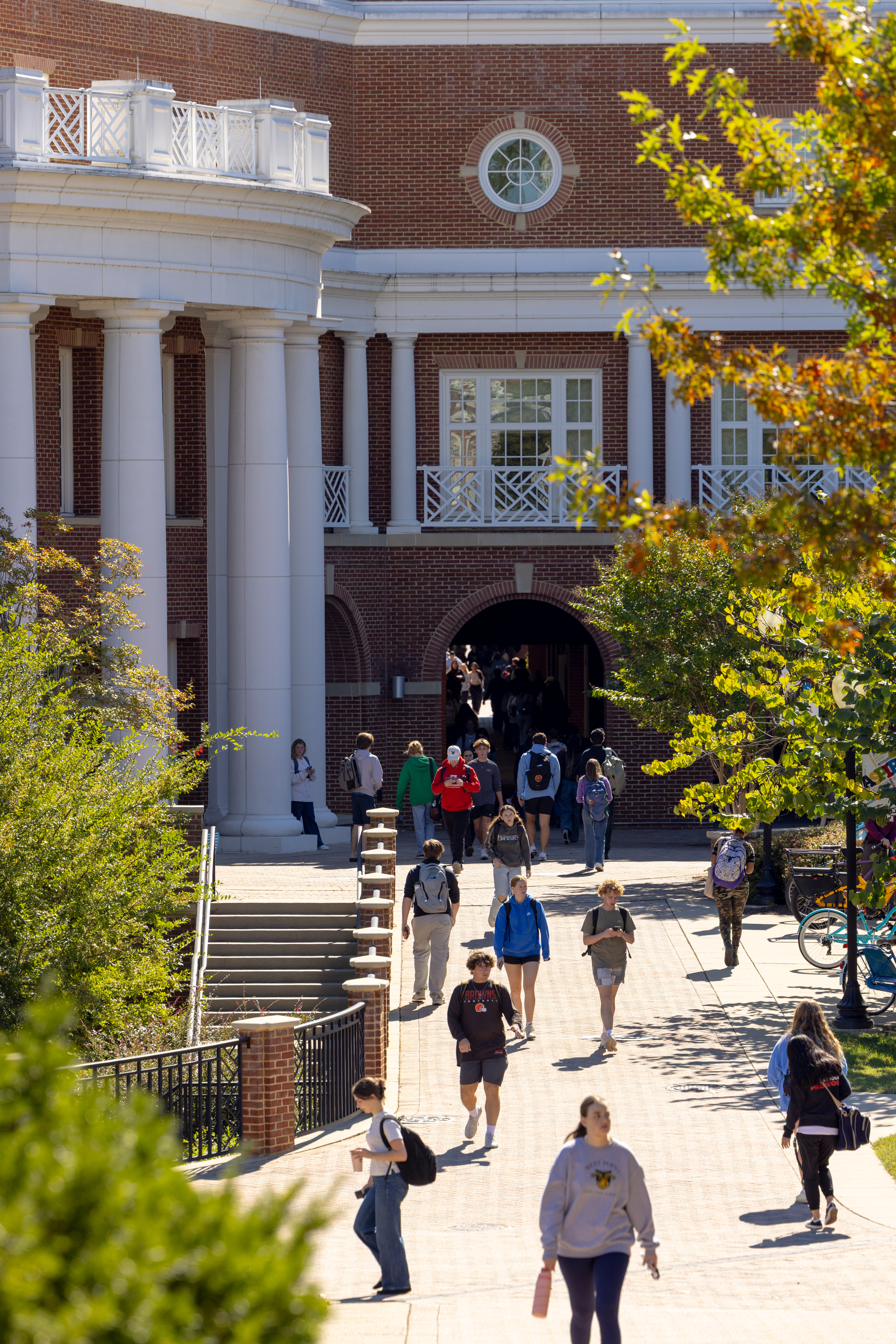 Students walk along Campus Walk on UMW&rsquo;s Fredericksburg campus.