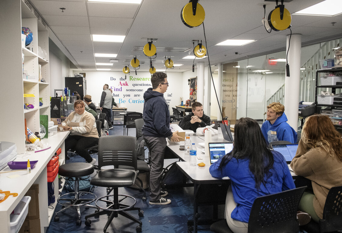 Students and faculty work together in the College of Education and Human Development makerspace.