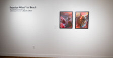 Works of art displayed on walls and sculpture situated around a room
