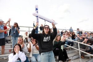 Alumni gather in the bleachers and cheer on UMW&rsquo;s athletic teams.