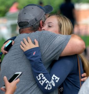 Parent hugging child