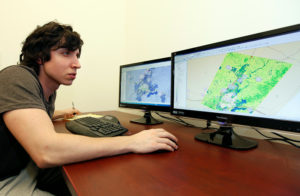 Associate Professor of Geography Brian Rizzo teaches a GIS class, Thursday, Feb. 23, 2012. (Photo by Norm Shafer)."