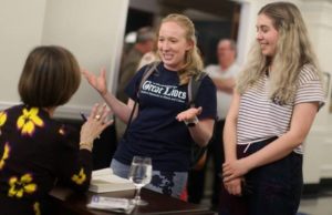 •Current students speak with guest lecturer during the book signing