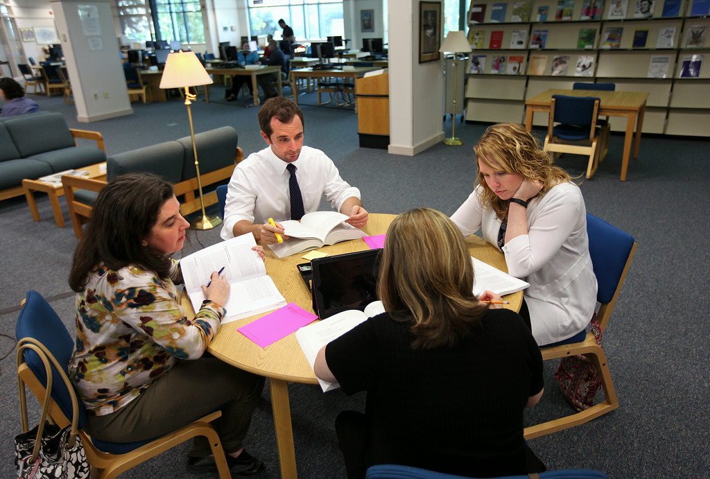 A class working at the Stafford Campus library