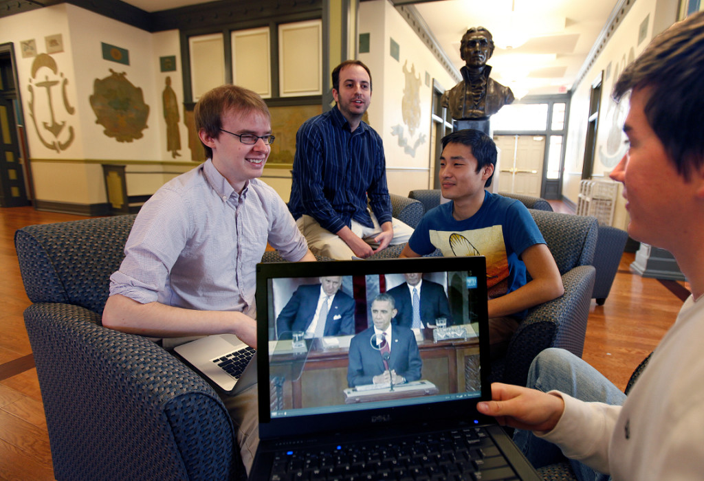 Political science professor Chad Murphy is working with students on a project that examines whether or not presidents are able to shift congressional behavior through nationally televised addresses, Monday Jan. 30, 2012. Posed situation in Monroe Hall.(Photo by Norm Shafer).