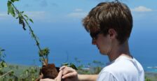 Student helping to plant trees in the Galápagos.